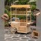 Vintiquewise Versatile Multi-Tier Shelves Wooden Rolling Cart - Perfect for Festival, Event Stand, Food Tasting Table, Garden Floral Display Rack, & Home Decor with Straw Roof and 2 Wood Wheels